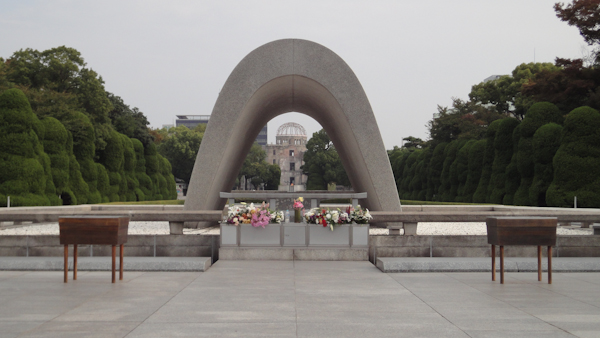 a view through a curved sculpture of the bomb dome